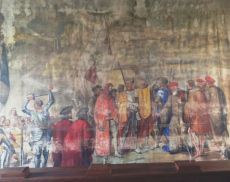 Sipario di scena del Teatro degli Astrusi con l’arrivo a Montalcino degli esuli senesi del 1555